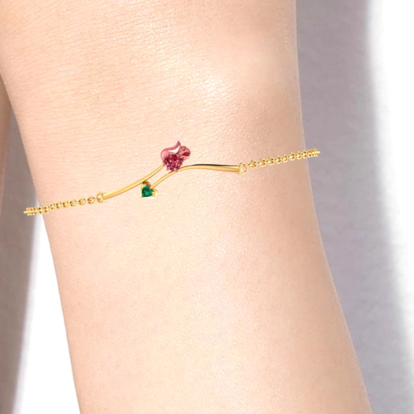 14k Gold Bracelet With A Yellow Shaped Design And A Green Stone For Cheap